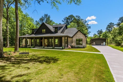 Photo of 157 Wagon Pass Drive, Huntsville, TX 77340 (MLS # 33623749)