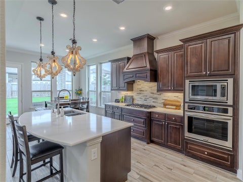 Photo of 10923 Sunnydale Ridge Lane, Cypress, TX 77433 (MLS # 25854255)