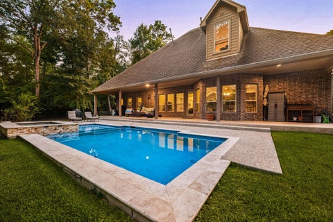 Photo of 1904 Boulder Ridge Drive, Conroe, TX 77304 (MLS # 80937511)