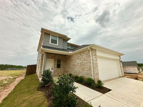 Photo of 12198 Ridge Top Drive, Conroe, TX 77304 (MLS # 40950760)