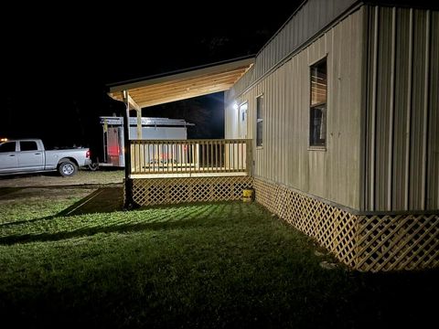 Photo of 411 Oak Tree Drive, Point Blank, TX 77364 (MLS # 68135952)