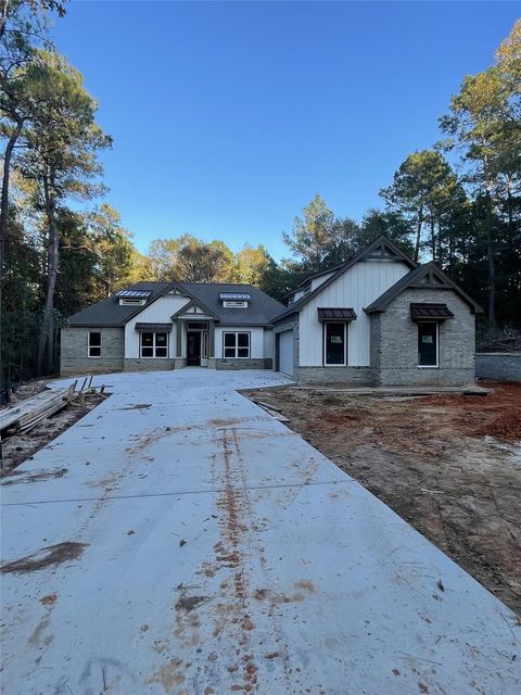 Photo of 236 Dipping Vat Road, Huntsville, TX 77340 (MLS # 59953692)