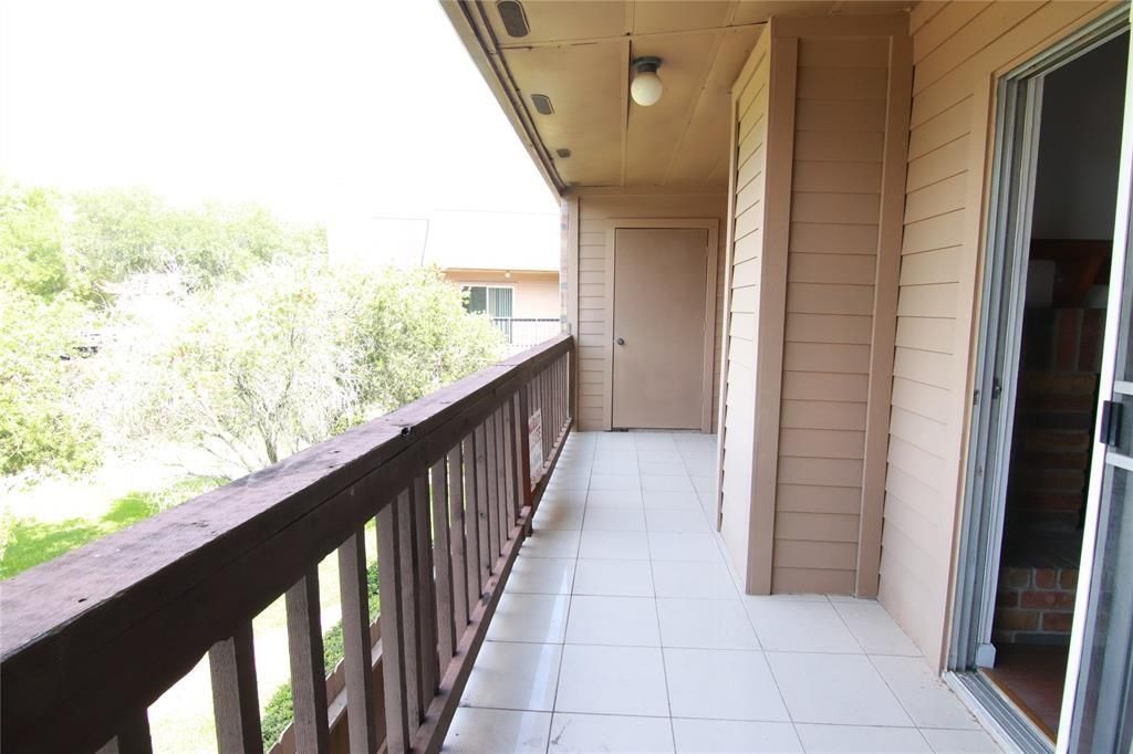 Photo of 10555 Turtlewood Ct Ct #1001, Houston, TX 77072 (MLS # 57050858)