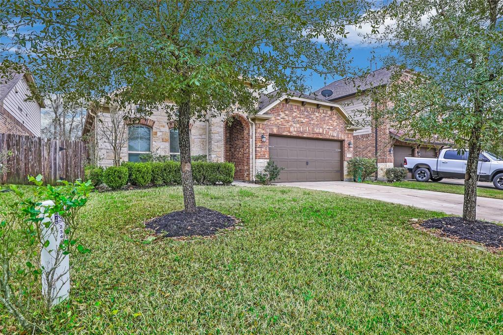 Photo of 23430 Banks Mill Drive Dr, New Caney, TX 77357 (MLS # 74208083)