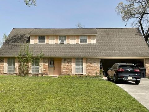 Photo of 1615 Hill Top Lane, Houston, TX 77339 (MLS # 46619450)