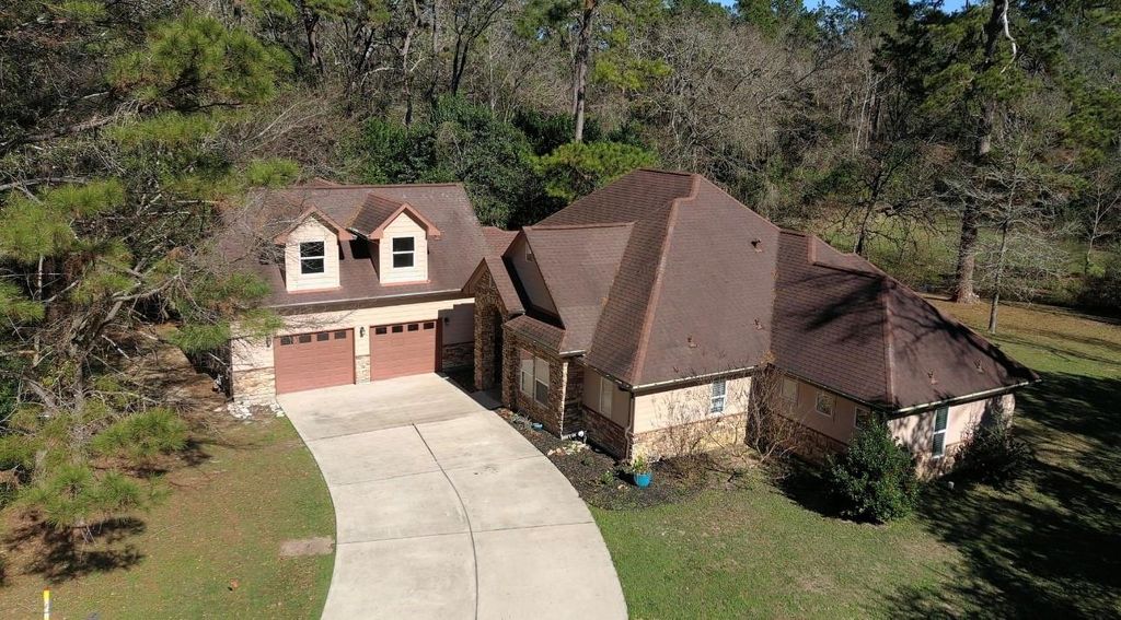 Photo of 12207 Mustang Avenue, Willis, TX 77378 (MLS # 61125959)