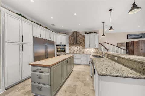 Photo of 6317 Riverview Way, Houston, TX 77057 (MLS # 94832427)