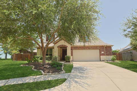 Photo of 10546 Hartfield Bluff Lane, Cypress, TX 77433 (MLS # 12442541)