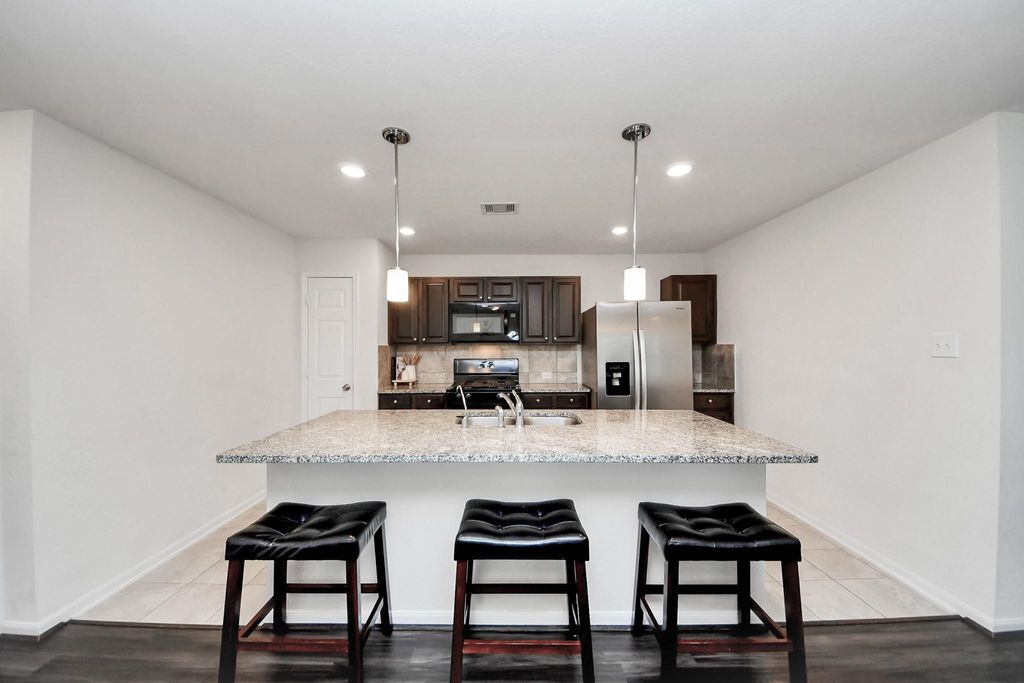 Photo of 11647 Rosewood Forest Court, Houston, TX 77038 (MLS # 20399361)