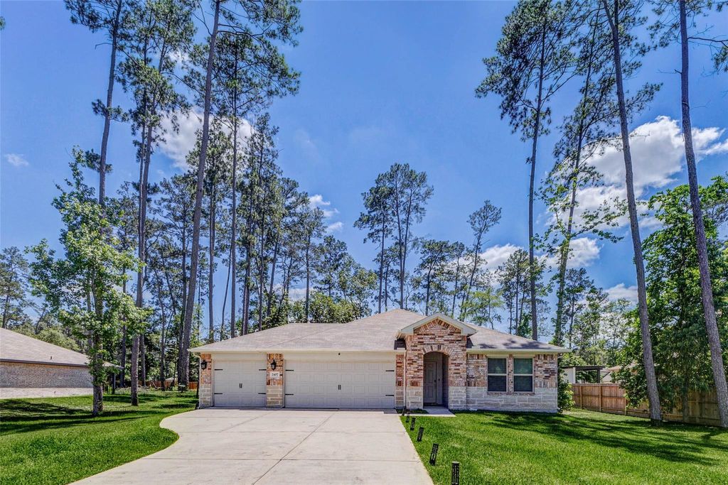 Photo of 2407 S Colosseum Court, New Caney, TX 77357 (MLS # 97740015)