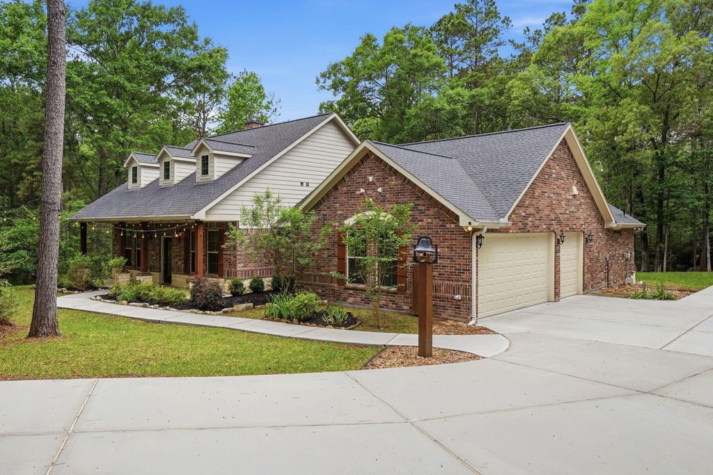 Photo of 323 Dipping Vat Road, Huntsville, TX 77340 (MLS # 79911028)