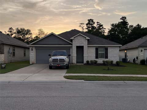 Photo of 312 Comal Drive NE, Huntsville, TX 77340 (MLS # 84253177)