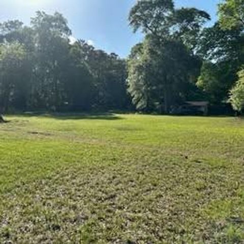 Photo of 220 Cherokee Trail, Livingston, TX 77351 (MLS # 97402709)