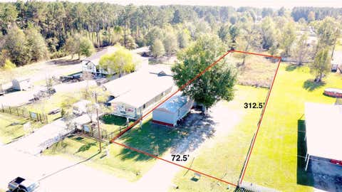 Photo of 1570 County Road 3479a, Cleveland, TX 77327 (MLS # 51268472)