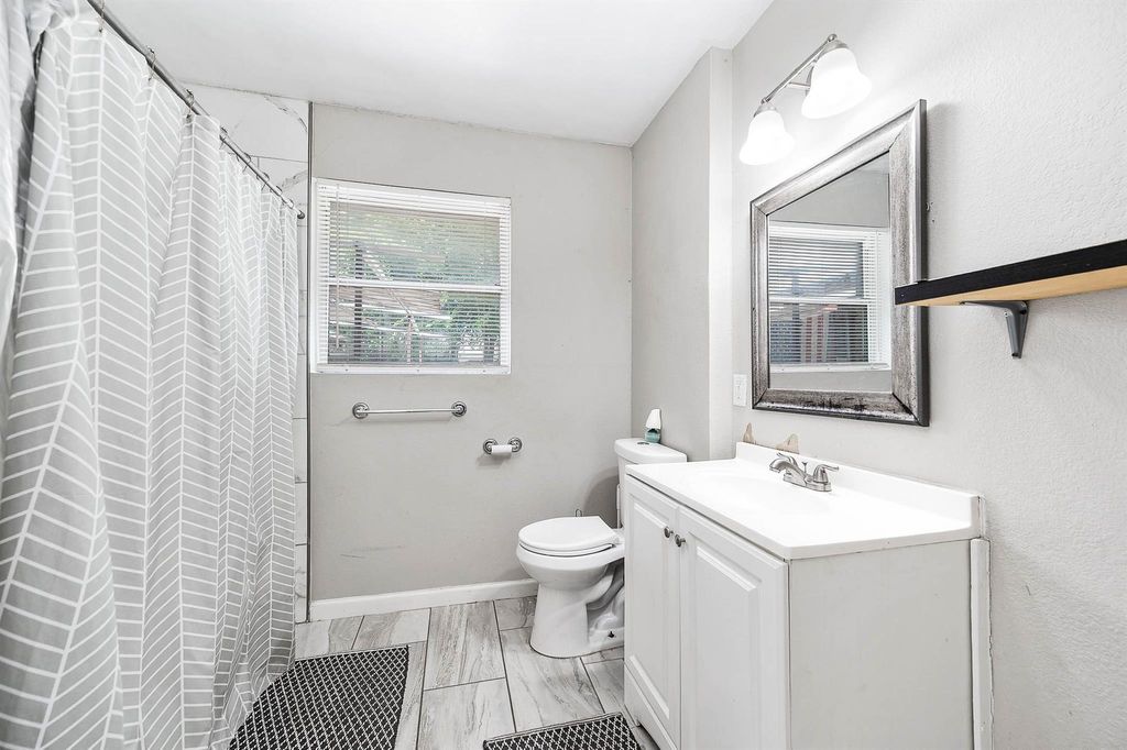 Photo of 122 W Riverwood Drive, Houston, TX 77076 (MLS # 14457122)