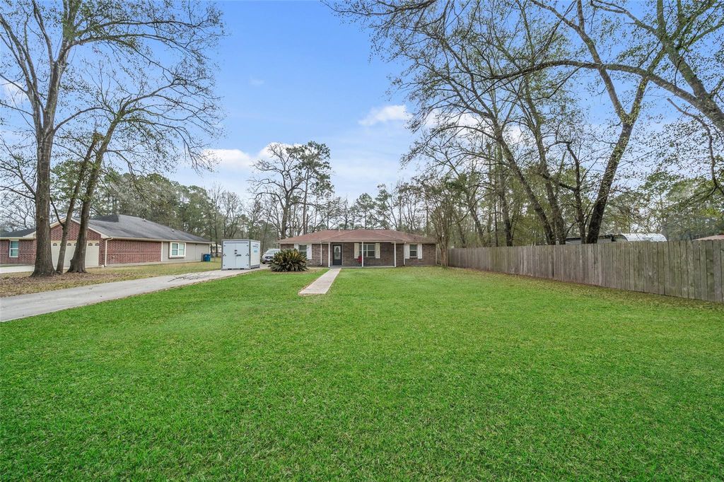 Photo of 21630 Punkin St Street, New Caney, TX 77357 (MLS # 17842816)