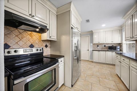 Photo of 5303 Heatherbrook Drive, Houston, TX 77045 (MLS # 48321008)