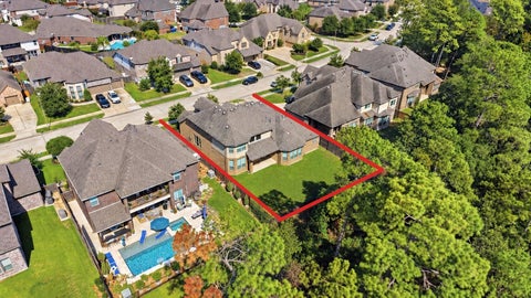 Photo of 13920 N Lake Branch Lane, Houston, TX 77044 (MLS # 64251172)