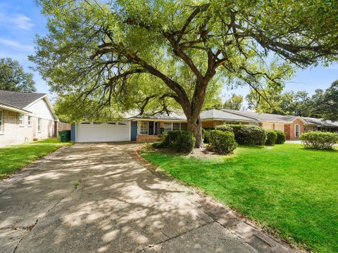 Photo of 9015 Bintliff Drive, Houston, TX 77074 (MLS # 74896906)