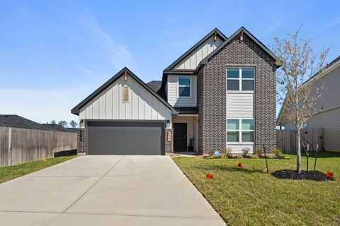 Photo of 815 Devils Bridge Street, Conroe, TX 77303 (MLS # 82507214)