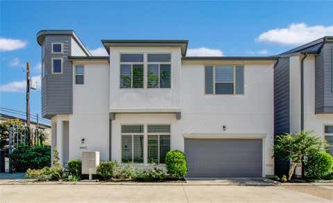 Photo of 8903 Spring Knoll Forest Drive, Houston, TX 77080 (MLS # 96733929)