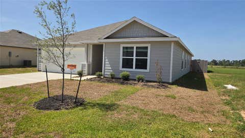 Photo of 10485 Sugar Mill Dr, Conroe, TX 77306 (MLS # 18822504)