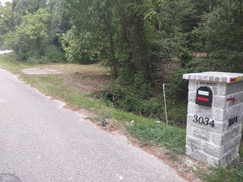 Photo of 3035 Old Colony Road, Huntsville, TX 77320 (MLS # 32311332)