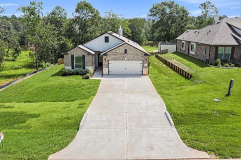 Photo of 11739 Oakwood Ranch Dr, Willis, TX 77378 (MLS # 66228625)