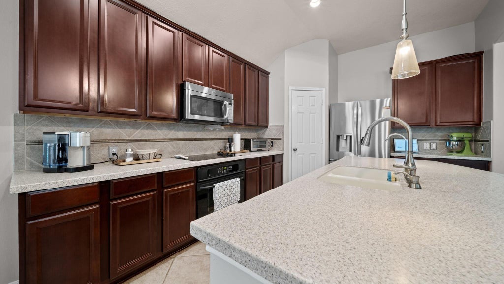 Photo of 13634 Caney Springs Lane, Houston, TX 77044 (MLS # 87429732)