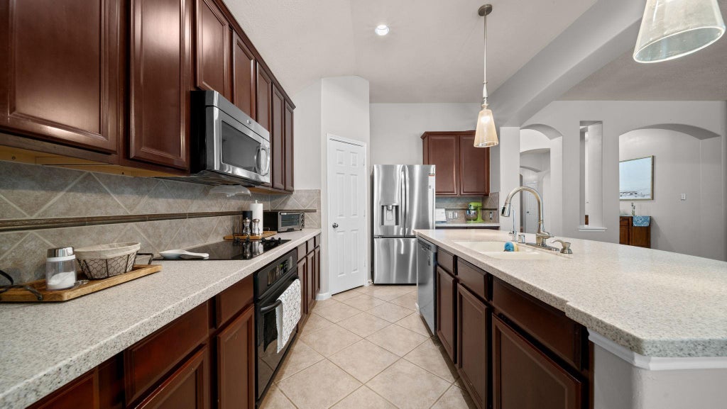 Photo of 13634 Caney Springs Lane, Houston, TX 77044 (MLS # 87429732)
