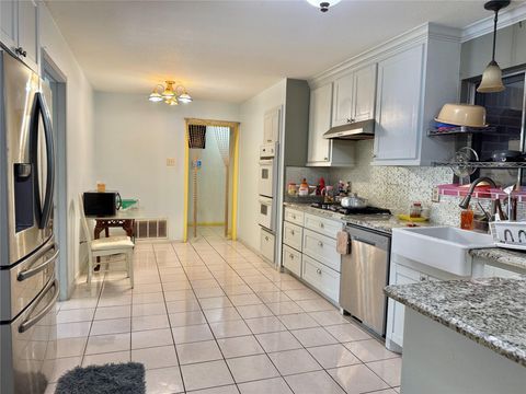 Photo of 8911 Lazy River Lane, Houston, TX 77088 (MLS # 76288033)