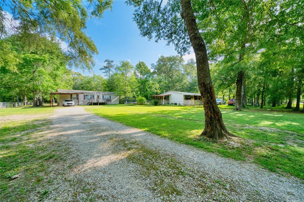 Photo of 103 County Road 370, Splendora, TX 77372 (MLS # 90212304)