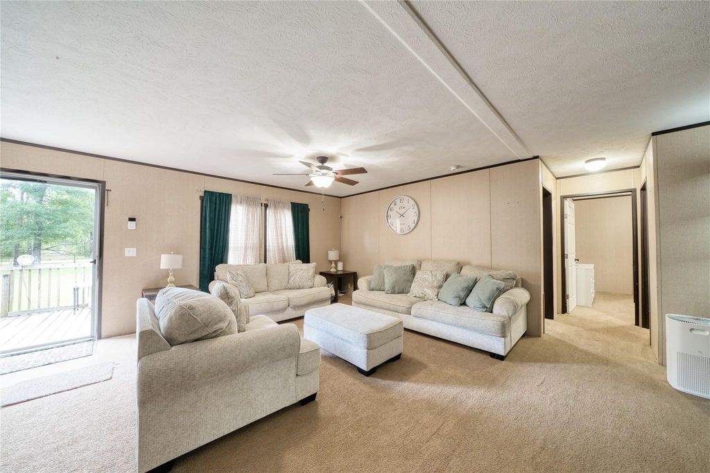 Photo of 103 County Road 370, Splendora, TX 77372 (MLS # 90212304)