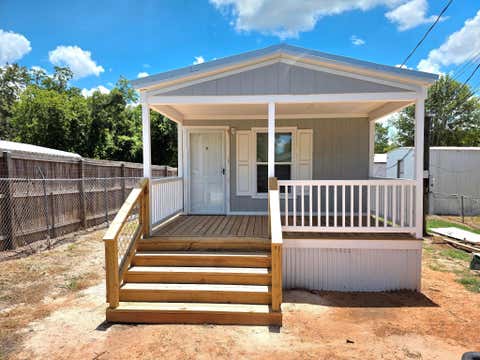 Photo of 401 S Woodson Street #10, Willis, TX 77378 (MLS # 35587784)