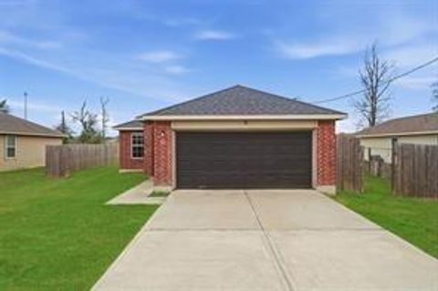 Photo of 47 Road 5103, Cleveland, TX 77327 (MLS # 96172704)