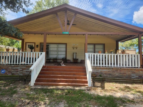 Photo of 3209 Mangum Road, Livingston, TX 77351 (MLS # 42803234)