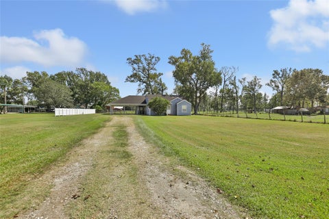 Photo of 1303 Fm-1409, Dayton, TX 77535 (MLS # 15321742)