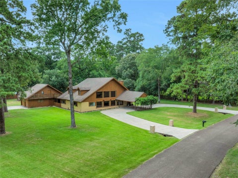 Photo of 15418 Willis Way, Conroe, TX 77384 (MLS # 81030257)