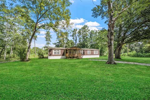 Photo of 3735 State Highway 150 W, New Waverly, TX 77358 (MLS # 79385450)