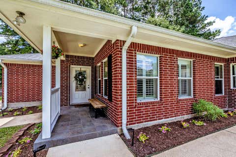 Photo of 501 Cherry Hills Drive, Huntsville, TX 77340 (MLS # 27944950)