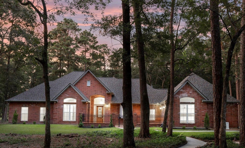 Photo of 10857 Lake Forest Drive, Conroe, TX 77384 (MLS # 22613660)