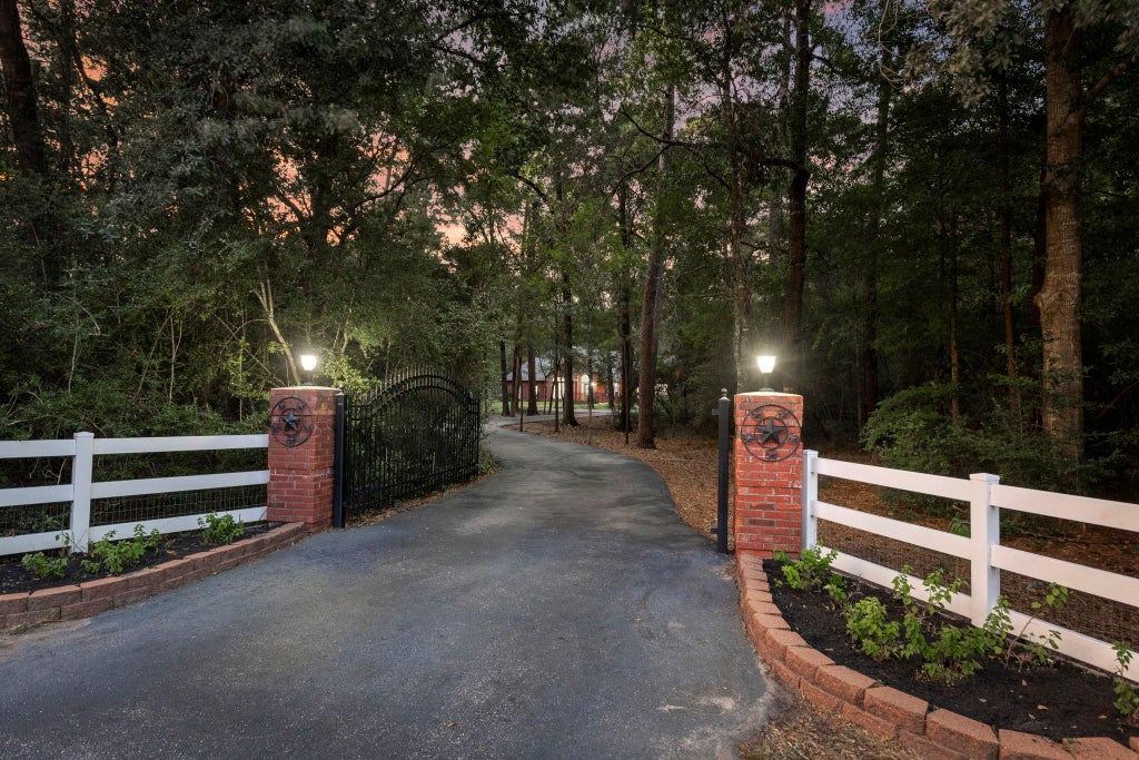 Photo of 10857 Lake Forest Drive, Conroe, TX 77384 (MLS # 22613660)