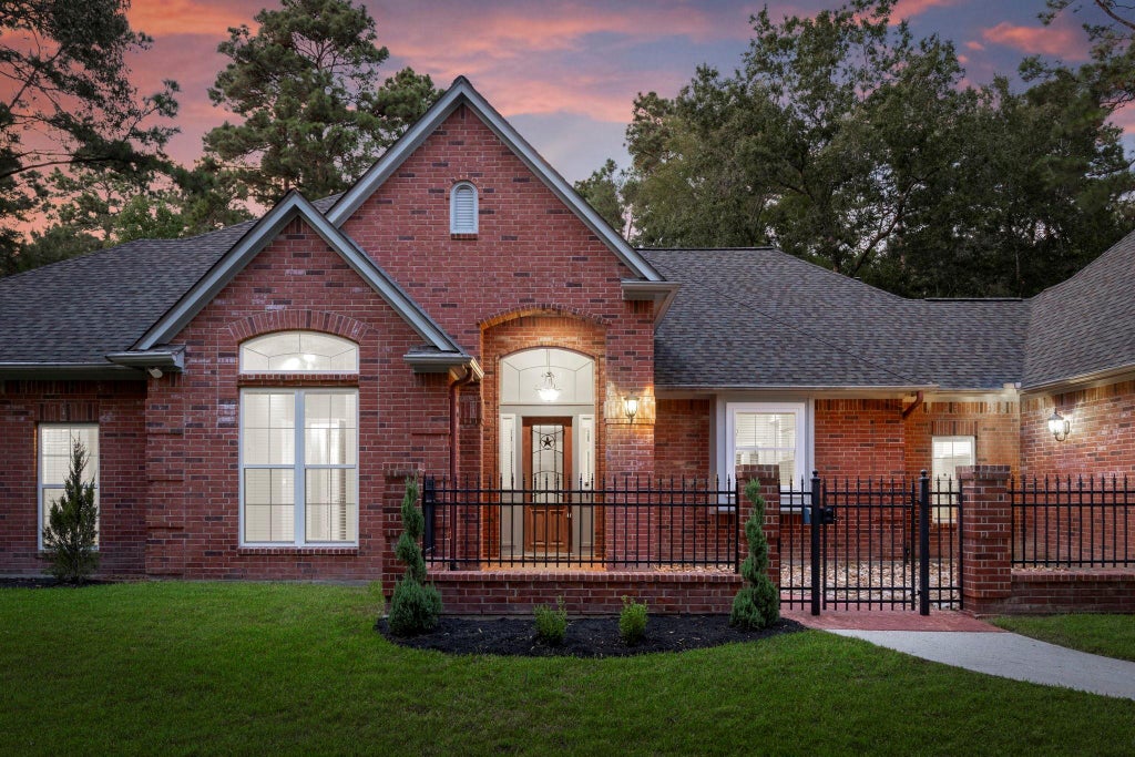 Photo of 10857 Lake Forest Drive, Conroe, TX 77384 (MLS # 22613660)