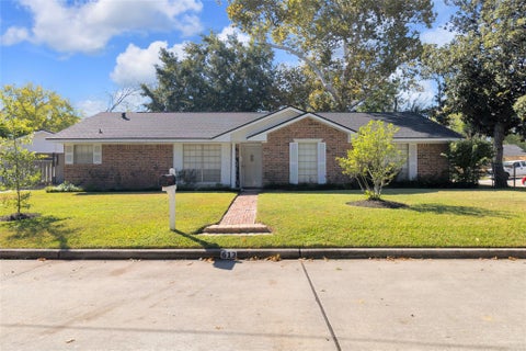 Photo of 613 N Avenue F, Humble, TX 77338 (MLS # 98763728)