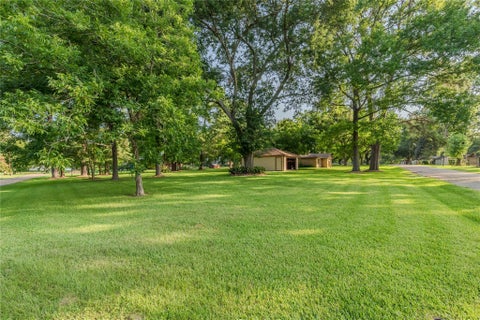 Photo of 0 Cozy Cove Lane, Willis, TX 77318 (MLS # 54109439)
