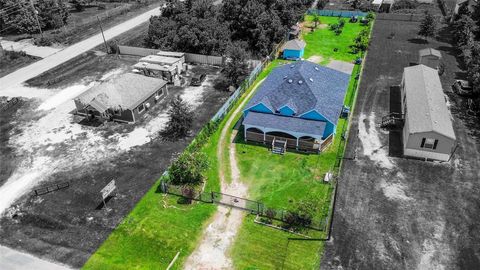 Photo of 1060 County Road 5021, Cleveland, TX 77327 (MLS # 64618204) Photo of 1060 County Road 5021, Cleveland, TX 77327 (MLS # 64618204)