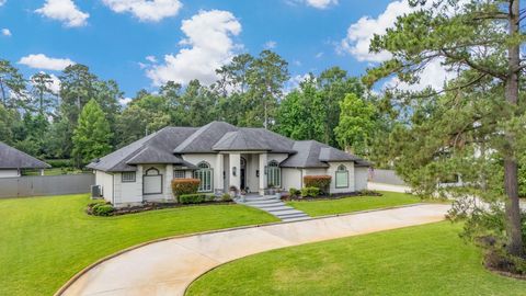 Photo of 11 Turtle Cove Court, Kingwood, TX 77346 (MLS # 88718117)