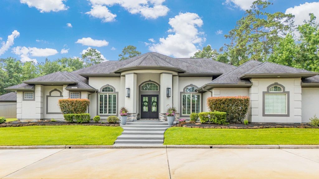Photo of 11 Turtle Cove Court, Kingwood, TX 77346 (MLS # 88718117)