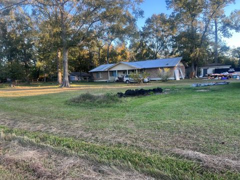 Photo of 1760 County Road 318, Cleveland, TX 77327 (MLS # 87444500)
