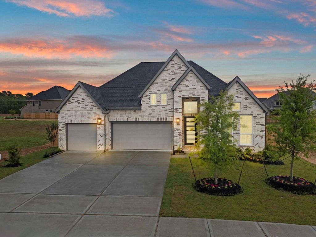 Photo of 618 Gunner Drive, Montgomery, TX 77316 (MLS # 49442003)